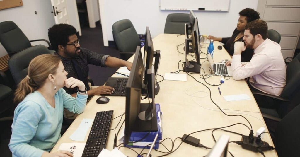 Admissions team reviewing student rank and GPA during application evaluation.